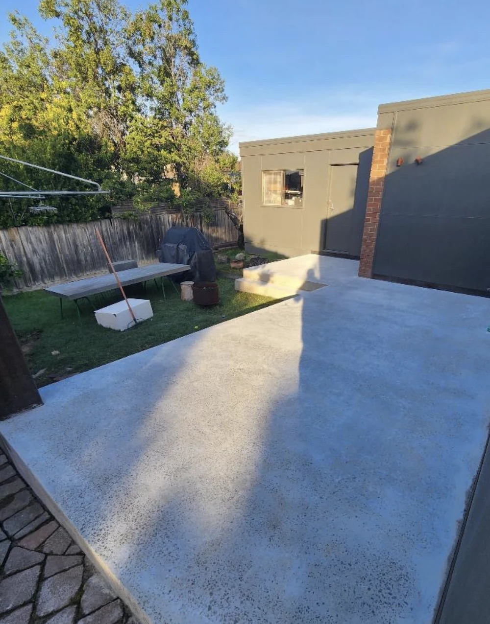 Outdoor concrete surface beside a residential building